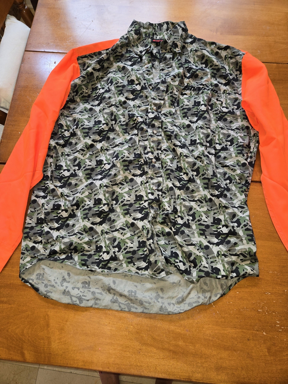 Men's Camouflage Button-Up Shirt with High-Visibility Orange Sleeves